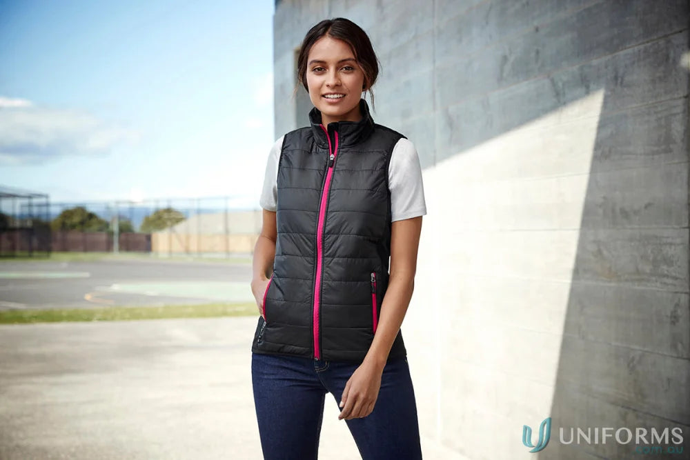 Women’s stealth vest J616L from Biz Collection Women’s with black puffer and hot pink zipper