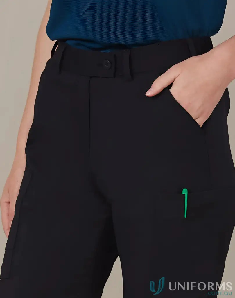 Ladies utility cargo pant with a green pen in pocket showing m9480 utility cargo style
