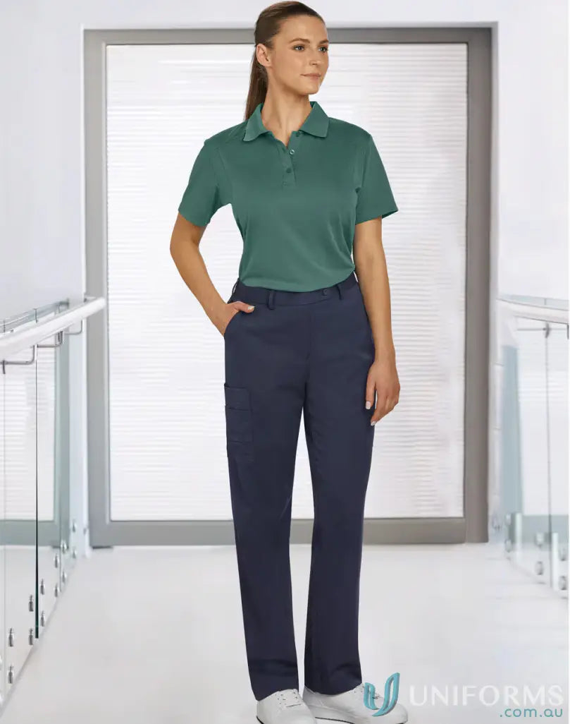 Woman in dark teal polo and navy cargo pants showcasing Ladies Utility Cargo m9480