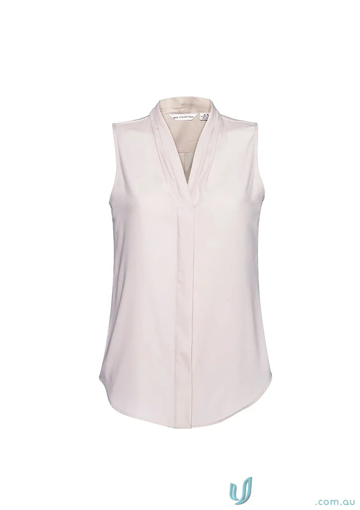 Madison Sleeveless Blouse with light pink color and sleeveless design for a professional look