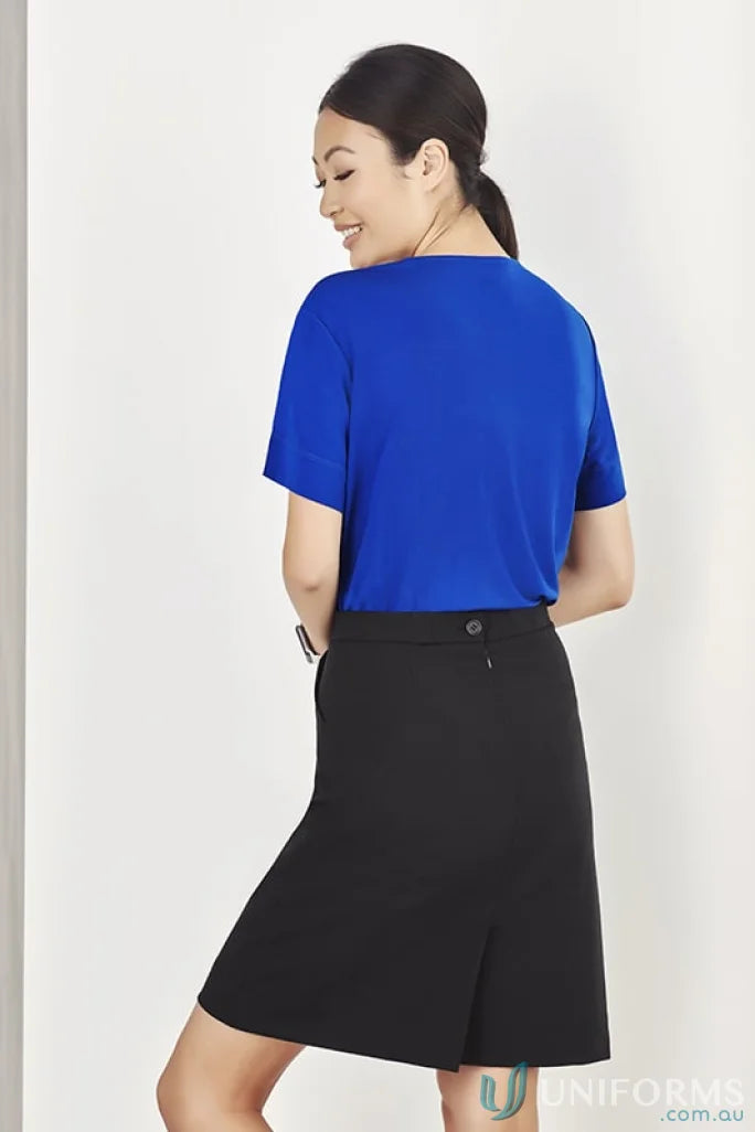 Woman in blue top and black skirt wearing Bizcare Marley Soft Jersey T-Top CS952LS
