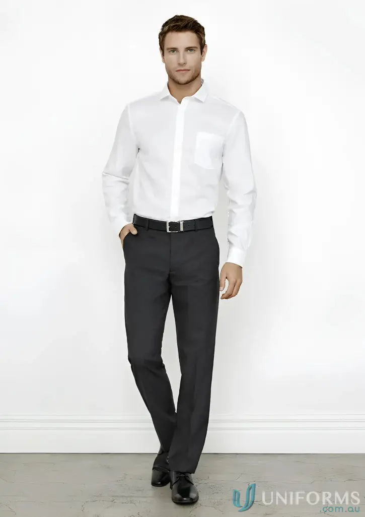 Man in white shirt and dark pants showcasing Mens Flat Front Pant fit and measurements