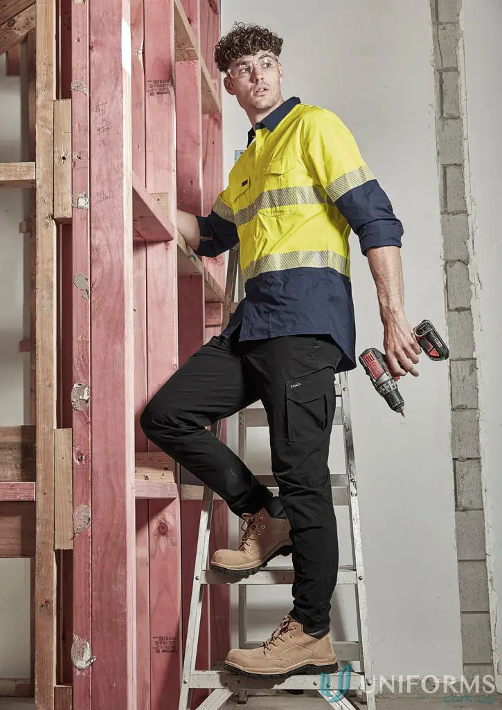 Construction worker on ladder wearing Mens Lightweight Outdoor Pant with large cargo pocket
