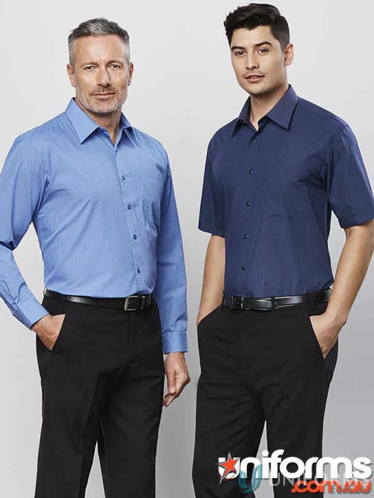Two men wearing men’s micro check short sleeve shirts and black pants outdoors