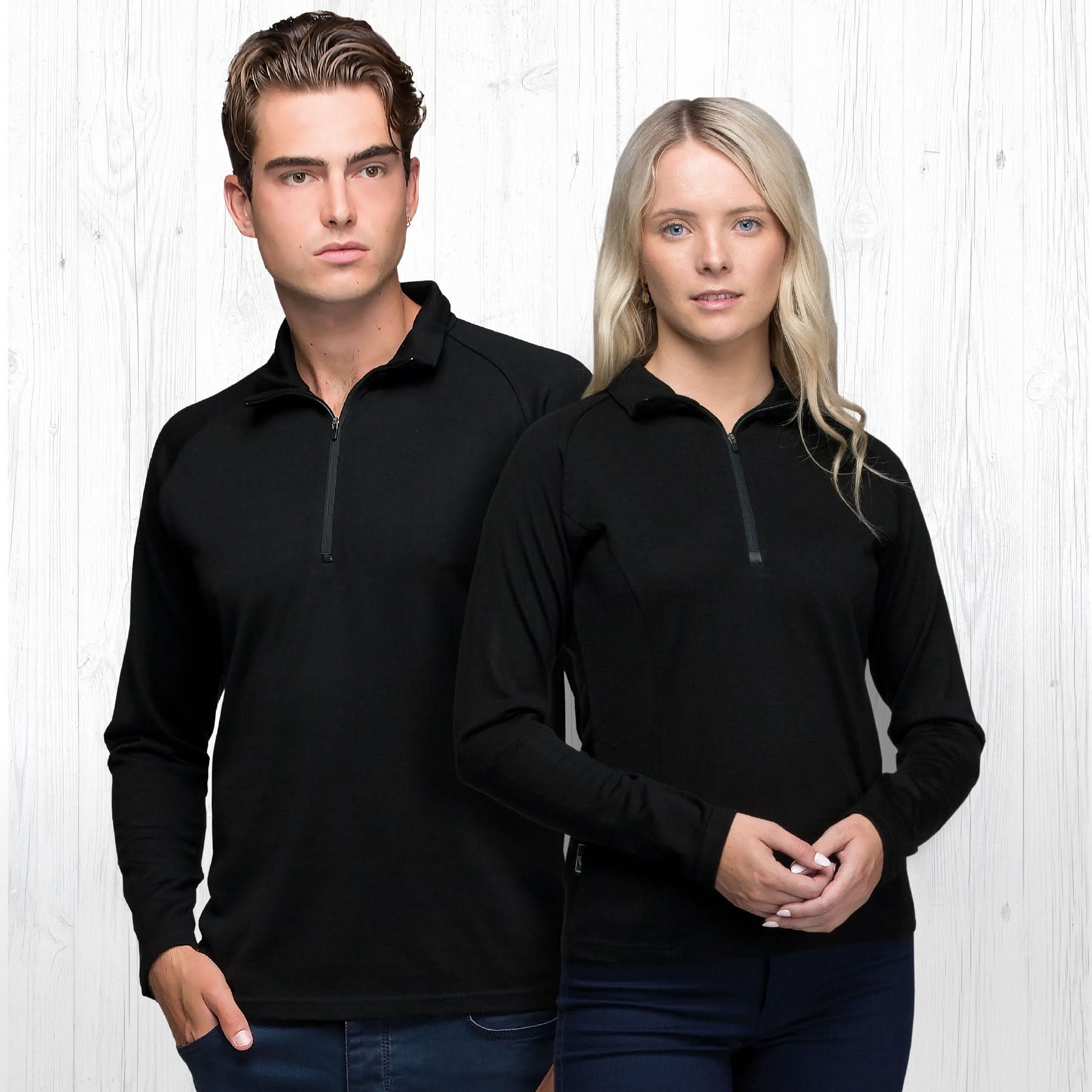 Two people in black merino wool GFL Zip Pullovers perfect for work uniforms