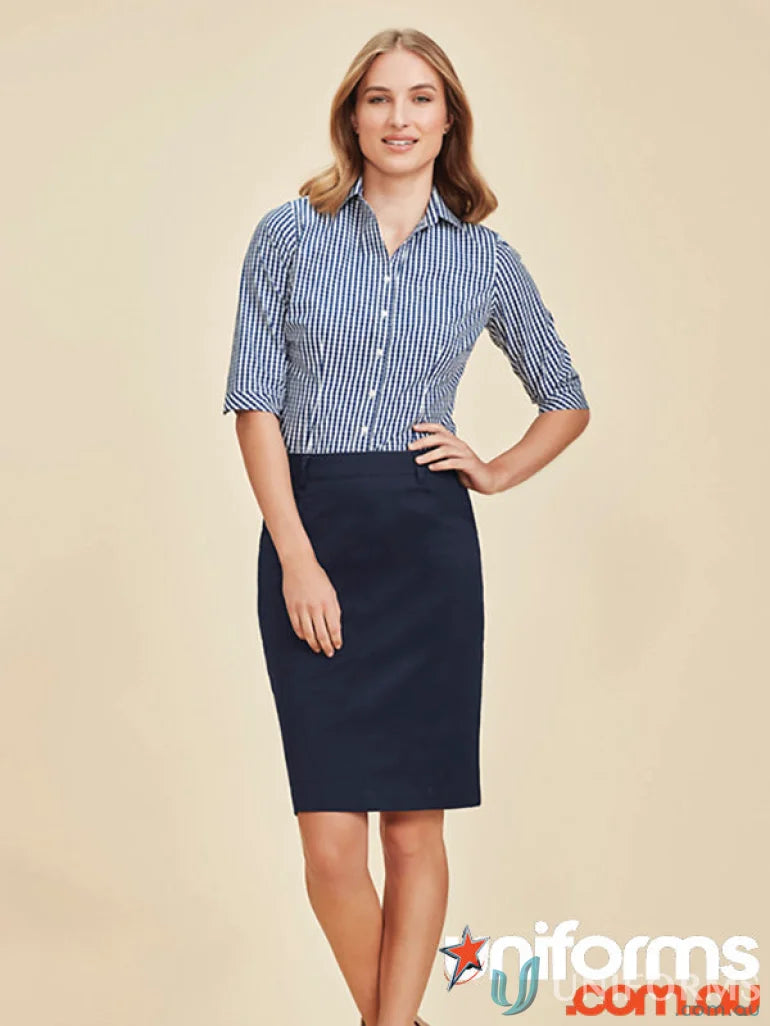 Woman wearing a striped shirt and navy Mid Waist Traveller Stretch Chino Skirt rgs264l