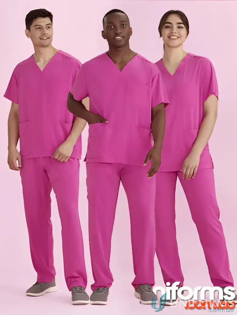Three people wearing NBCF Unisex Pink V-Neck Scrub Pant for national breast cancer awareness
