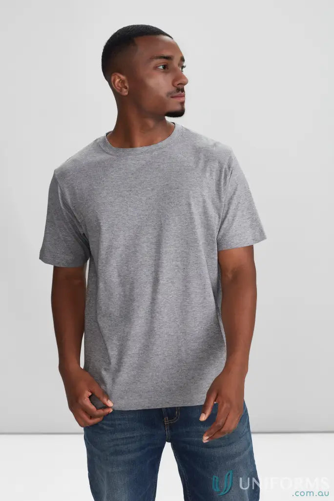 Man wearing heather grey Newport Tee from Biz Collection ice tee line in blue jeans