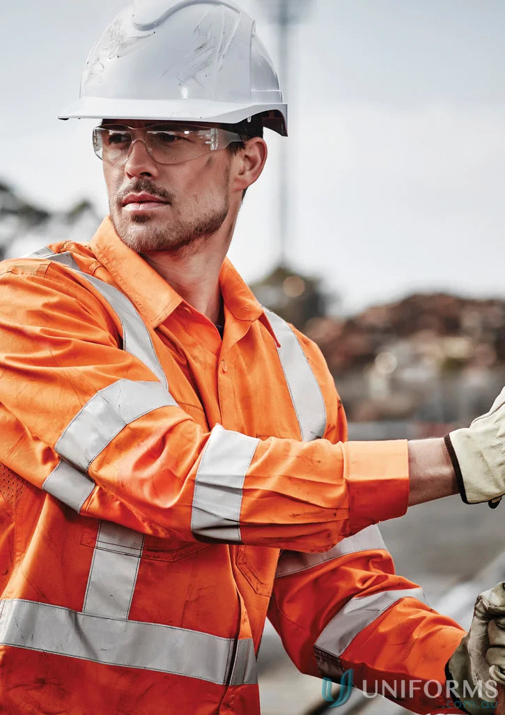 Construction worker in safety gear wearing NSW Rail HiVis BioMotion X Back LS Shirt with taped long sleeve