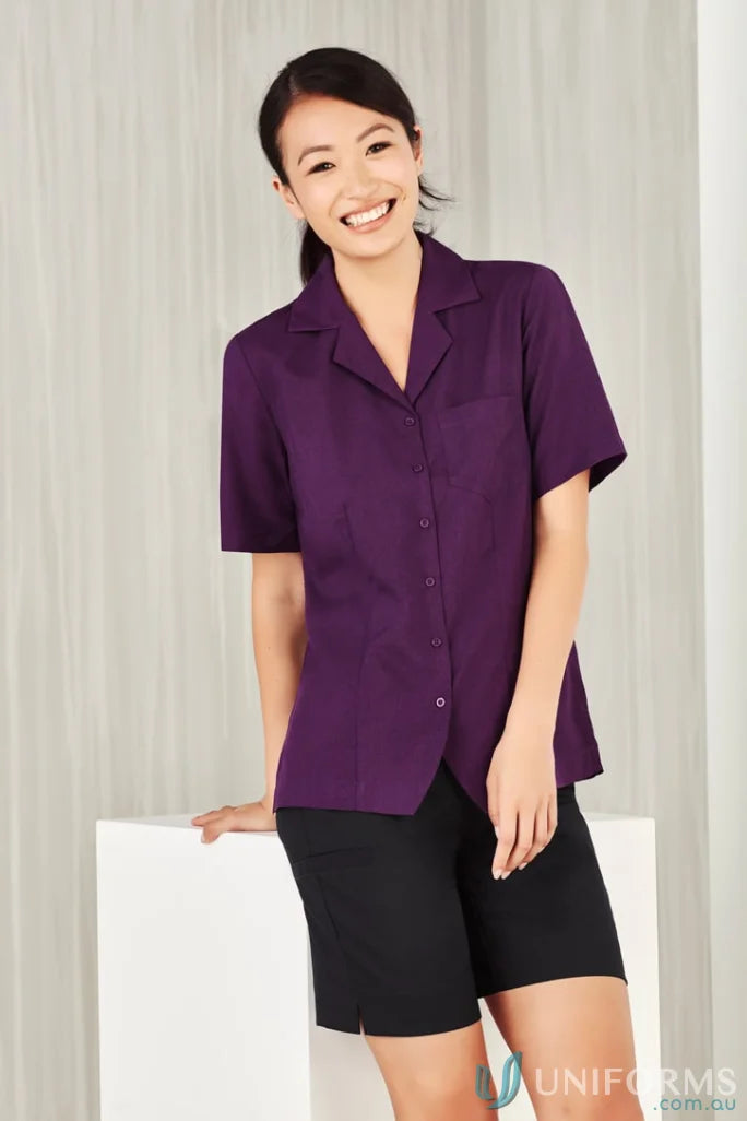 Woman in purple Oasis Plain Overblouse made with Biz ComfortCool fabric from Collection Oasis Plain