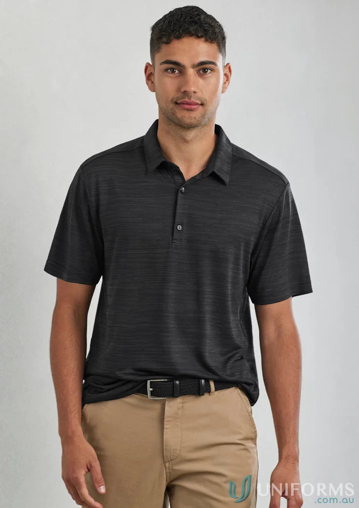 Man in black Orbit Polo with certified recycled polyester fabric and orbit short sleeve design