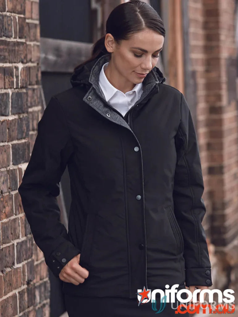 Woman wearing Parklands Ladies Jacket with added length and detachable hood coat