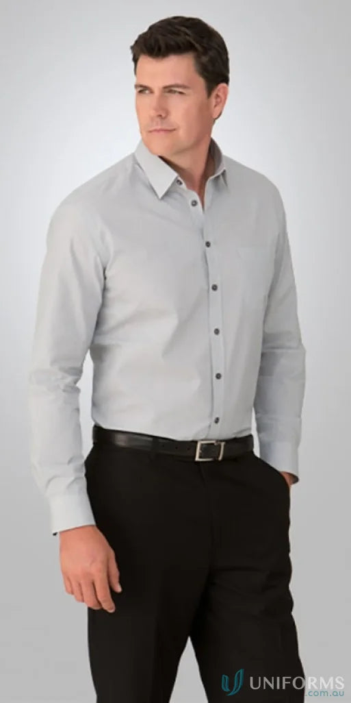 Man in a gray dress shirt and black pants showcasing the Pinfeather LS Shirt workwear
