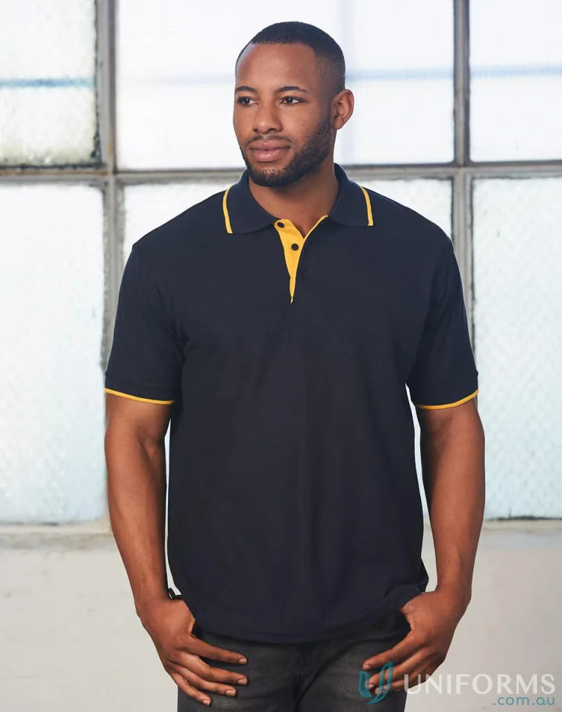 Black ps08 Liberty Polo with yellow trim, perfect workwear solution for winning spirit pique
