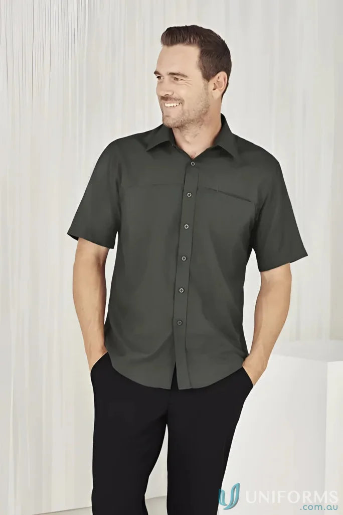 Man in a men’s Oasis Short Sleeve Shirt showcasing the Oasis Shirt collection