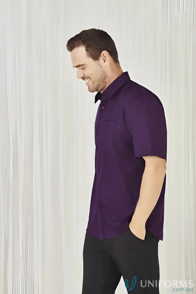 Man wearing a purple men’s Oasis short sleeve shirt from the Oasis Shirt collection