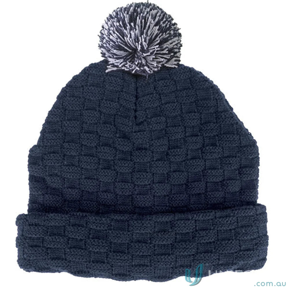 Navy blue pom pom beanie made with double layer knit, perfect for cold days