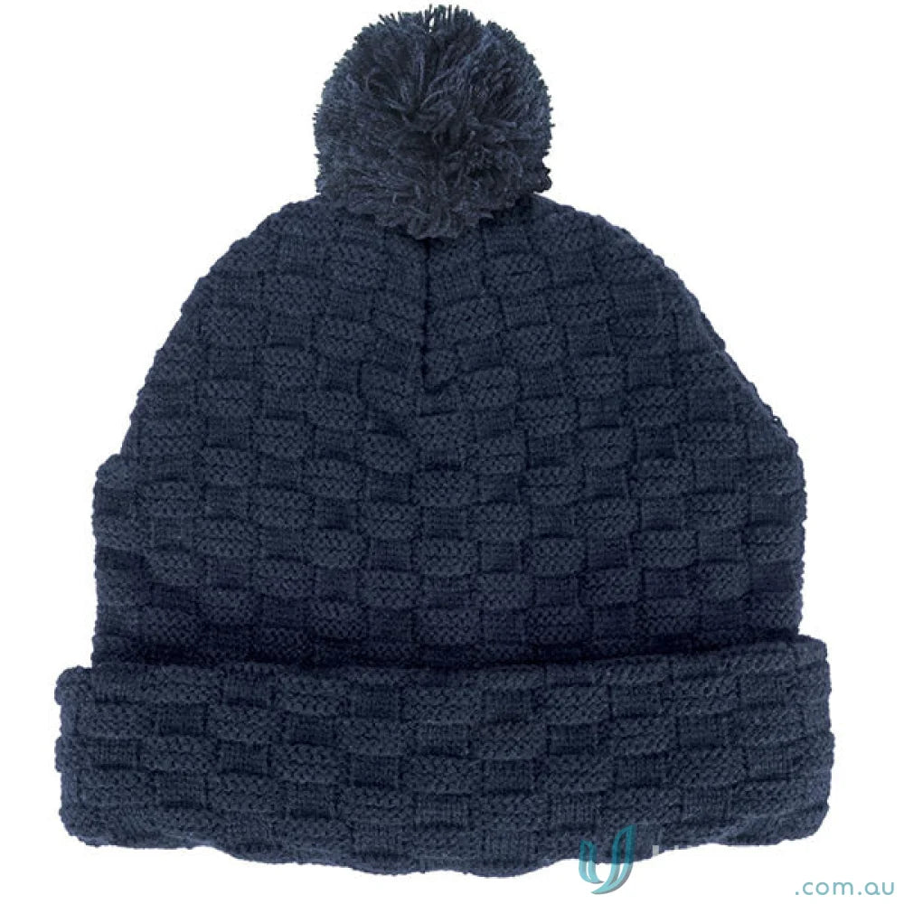 Blue Pom Pom Beanie with double layer knit, cozy winter gear from our marketing info sheet