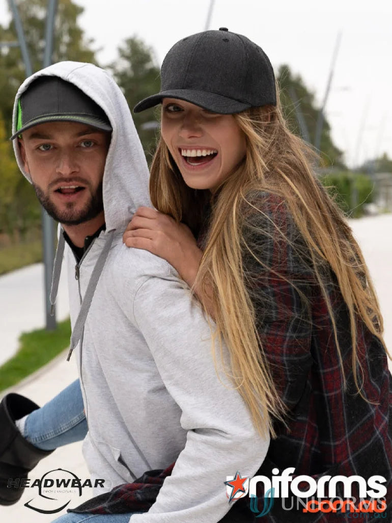 Two people wearing stylish caps from Premium American Twill Cap, perfect for workwear and uniforms