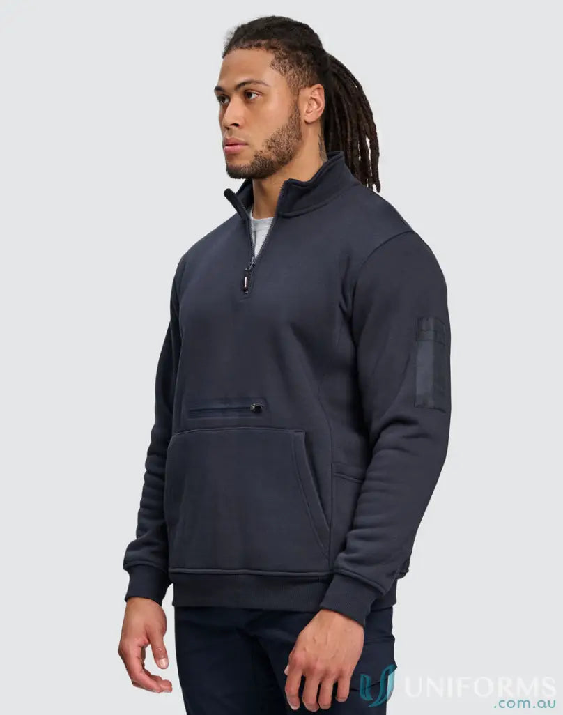 Man wearing a navy premium fleece half zip sweatshirt, perfect to handle tough jobs