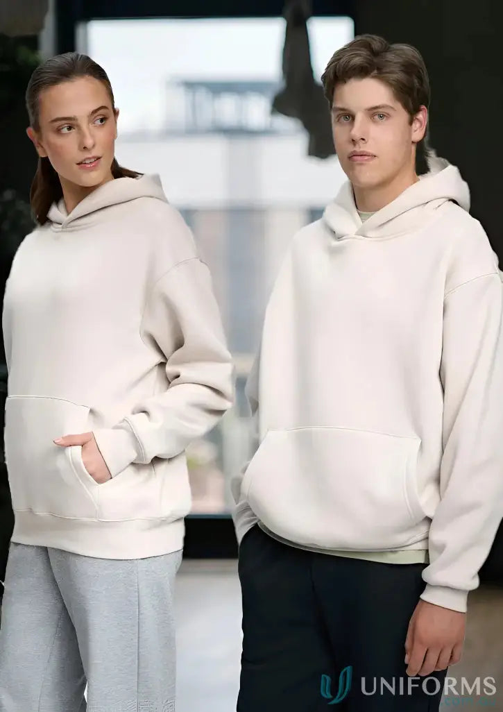 Two people wearing beige oversized fleece hoodie made with recycled polyester premium fleece