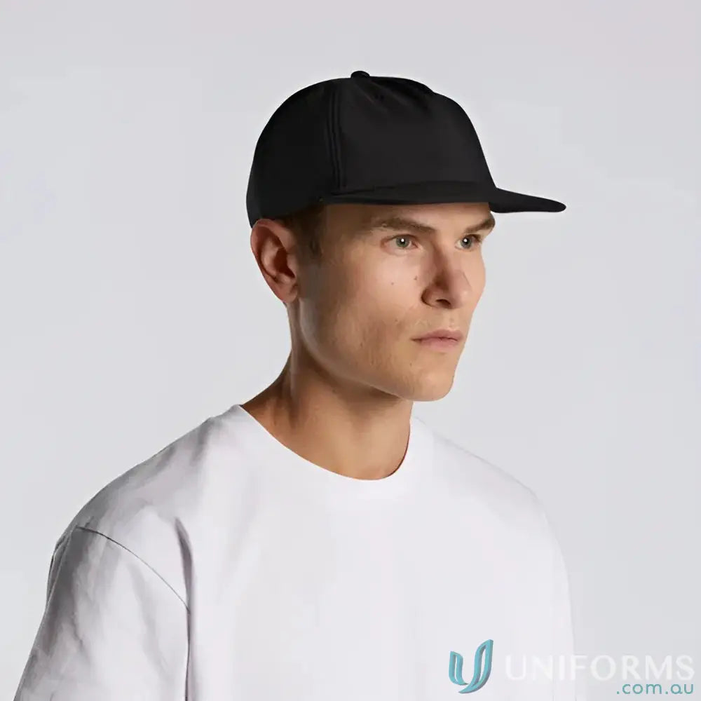 Man wearing black baseball cap with recycled polyester and fleece lining, mid profile style