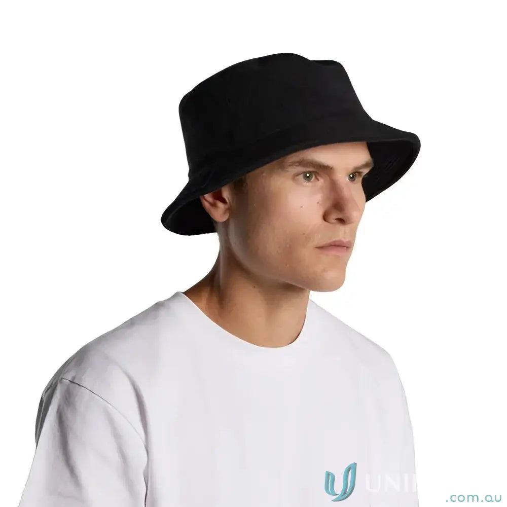 Man wearing a black cotton terry bucket hat with reinforced stitching for uniforms