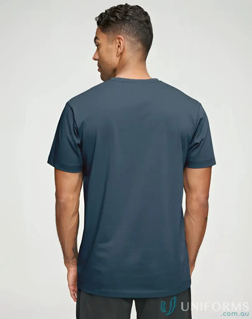 Man wearing a dark blue Premium Mornington T-Shirt, a winning spirit premium cotton face tee