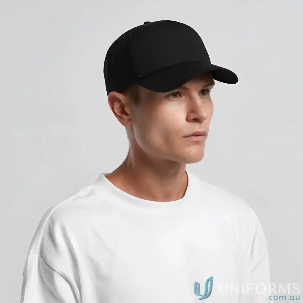 Man wearing black baseball cap with curved peak and plastic snapback, white tee