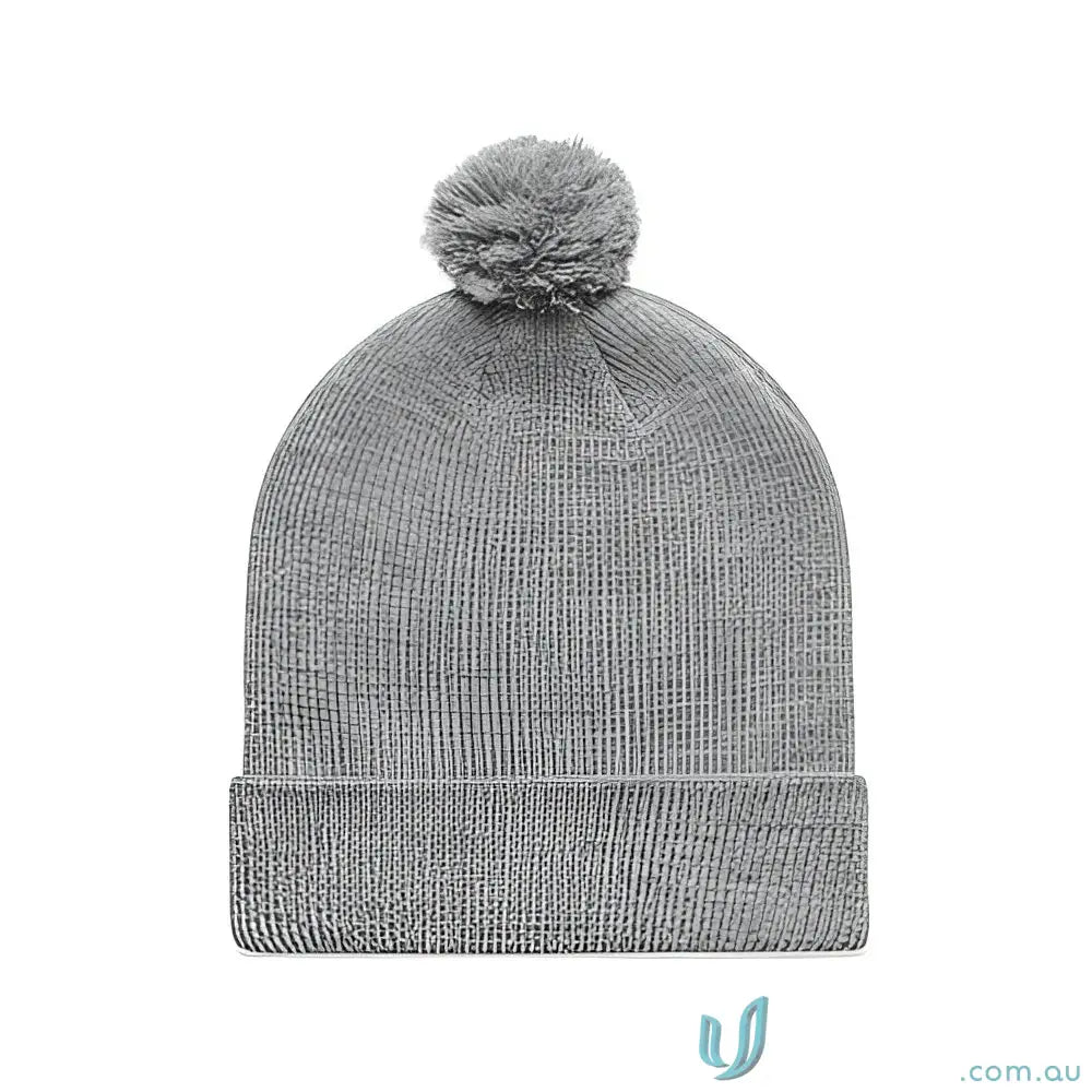 Gray knit beanie with pom pom made from recycled acrylic for cozy winter style
