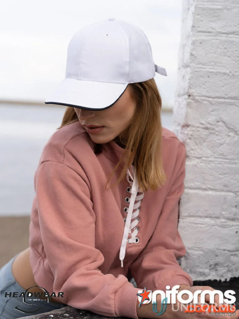 White baseball cap with black trim, eco-friendly recycled earth cap for sustainable style