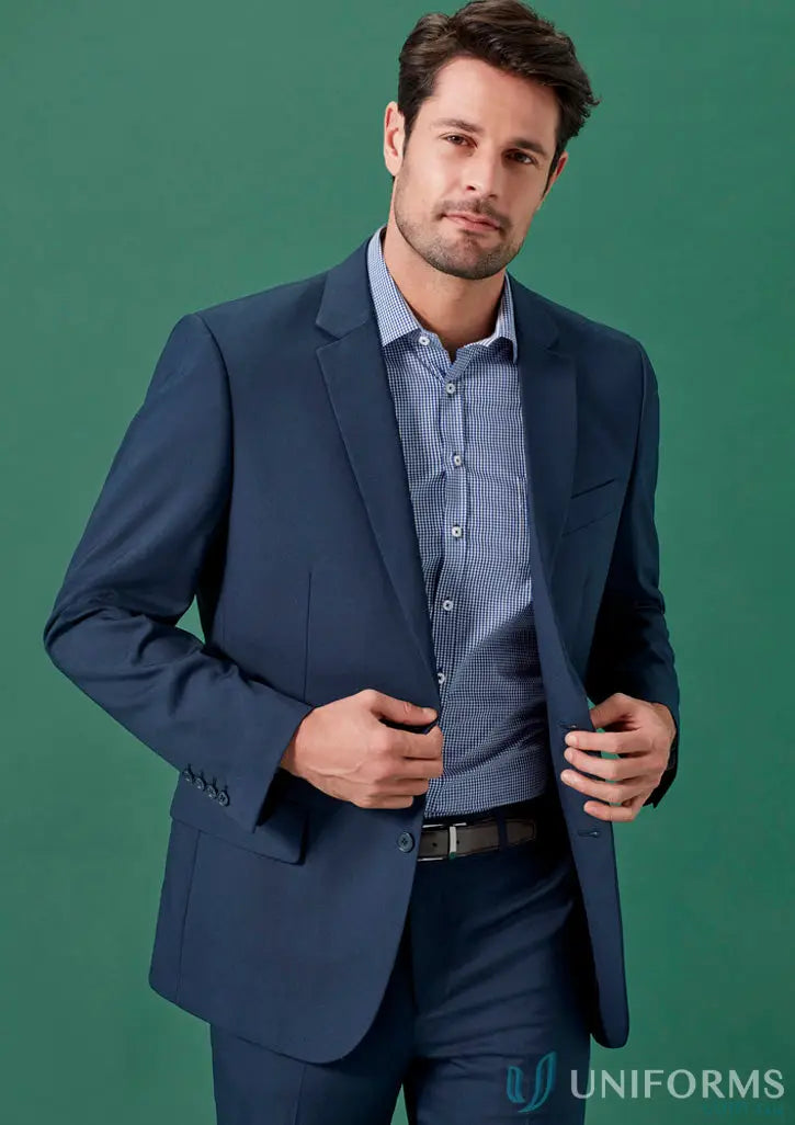 Man in blue suit with striped shirt wearing Renew City Fit Jacket made from recycled polyester