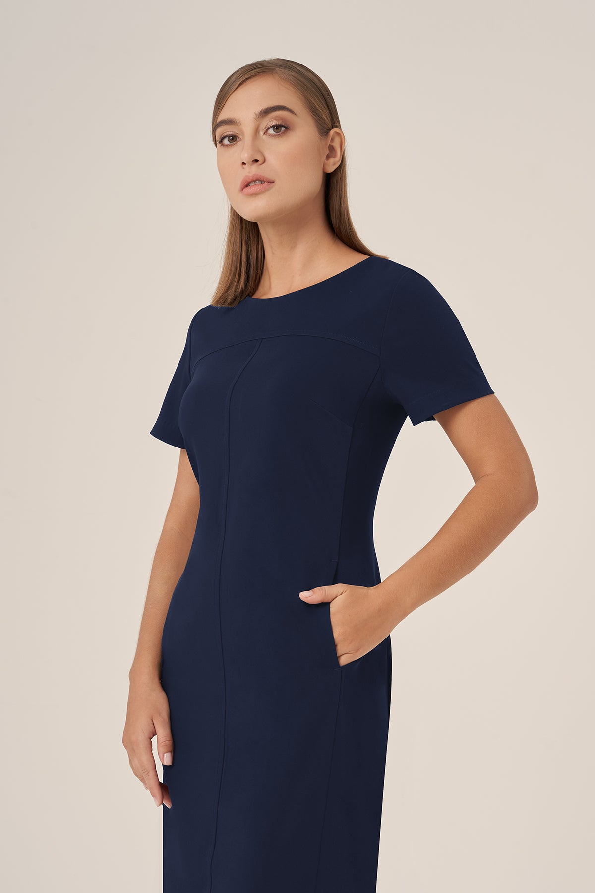 Navy blue short-sleeved Riley dress FDR461 with pocket detail