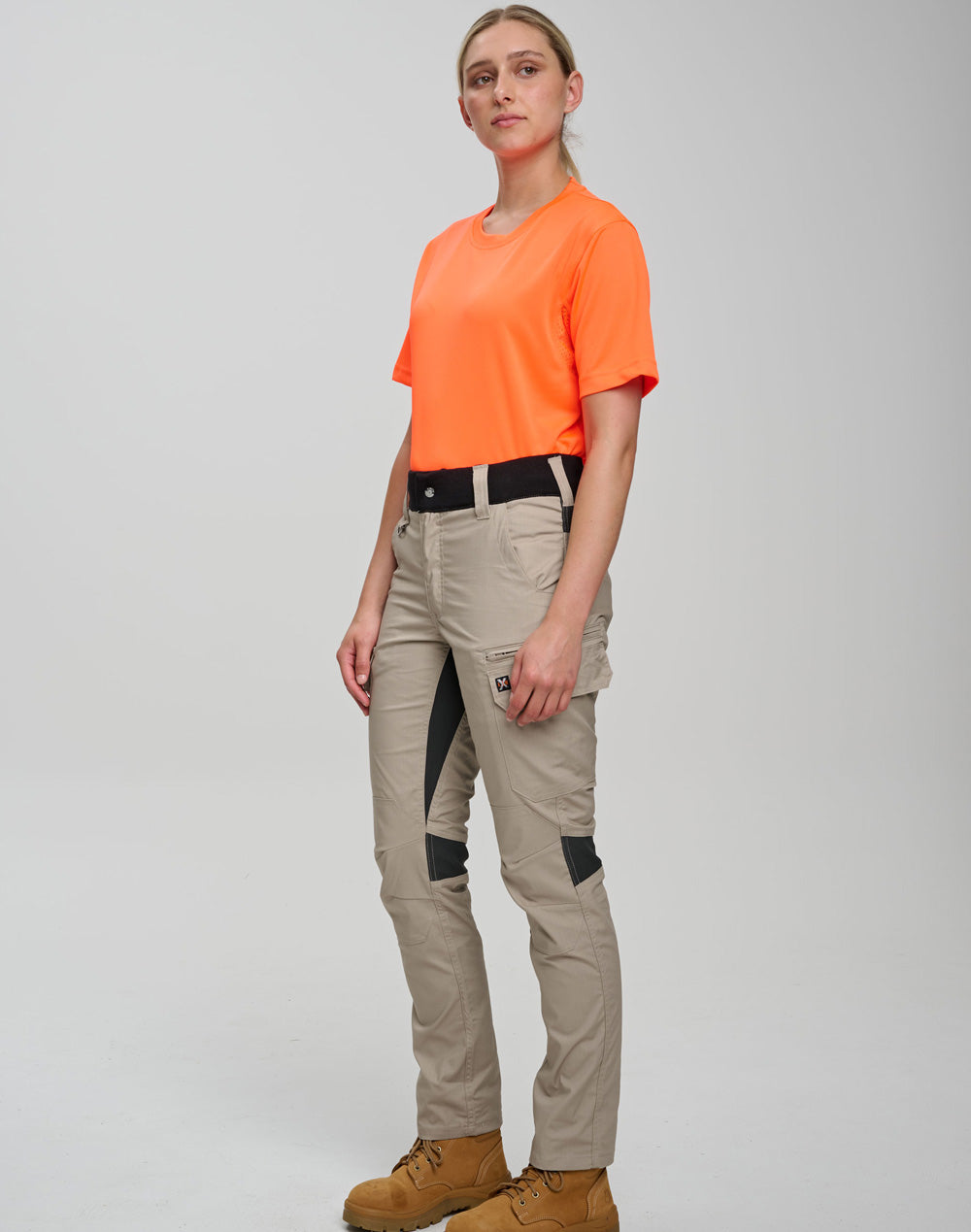 Beige ripstop stretch work pants with black knee patches and pockets
