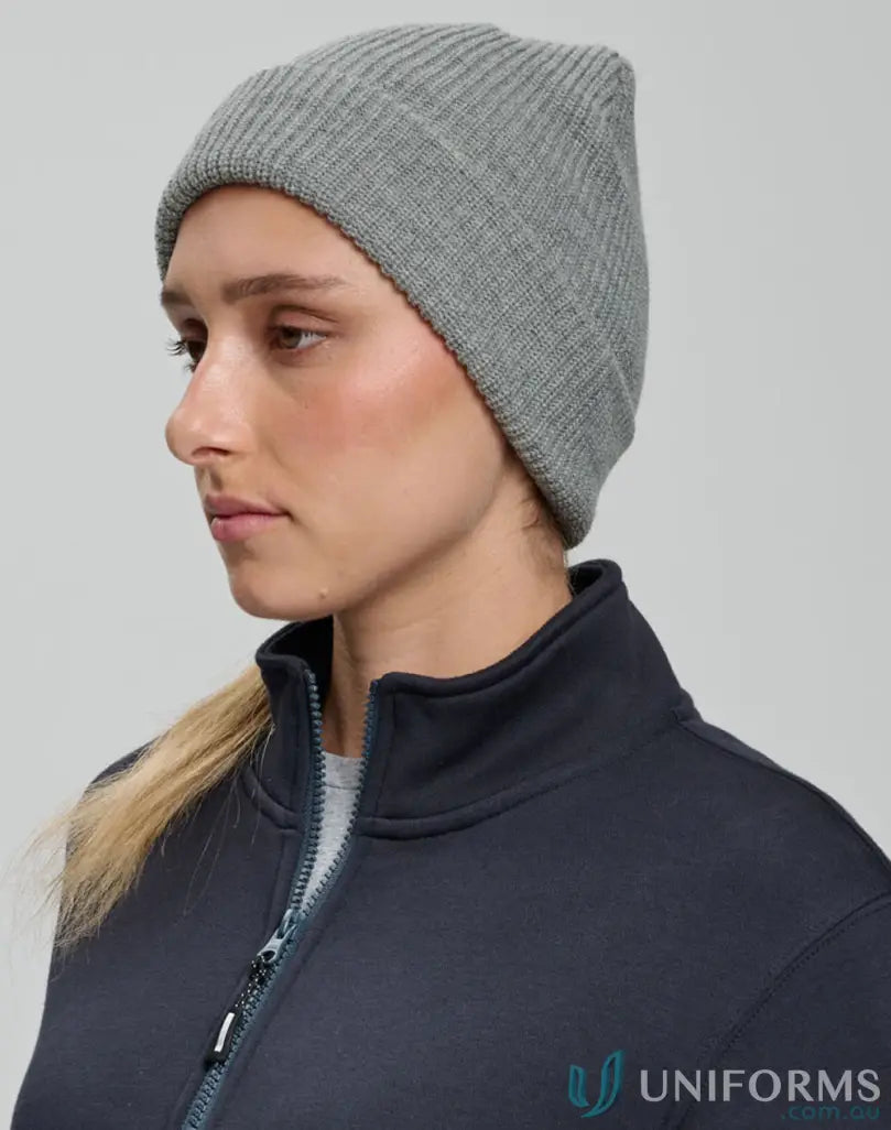 Gray knit snug beanie with cable knit pattern from the winning spirit roll collection