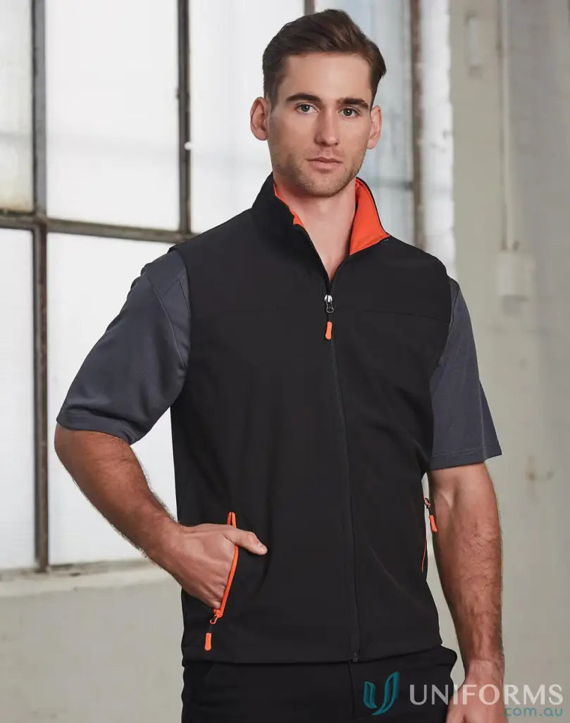 Men’s black and grey soft shell vest with orange accents from JK45 Rosewall, perfect for winning spirit