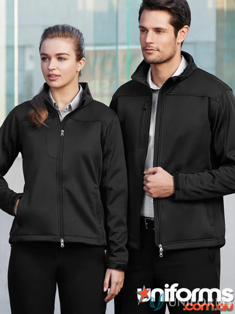Two people wearing black RS Centre EMB Mens SoftShell Jackets with bonded polyester fabric