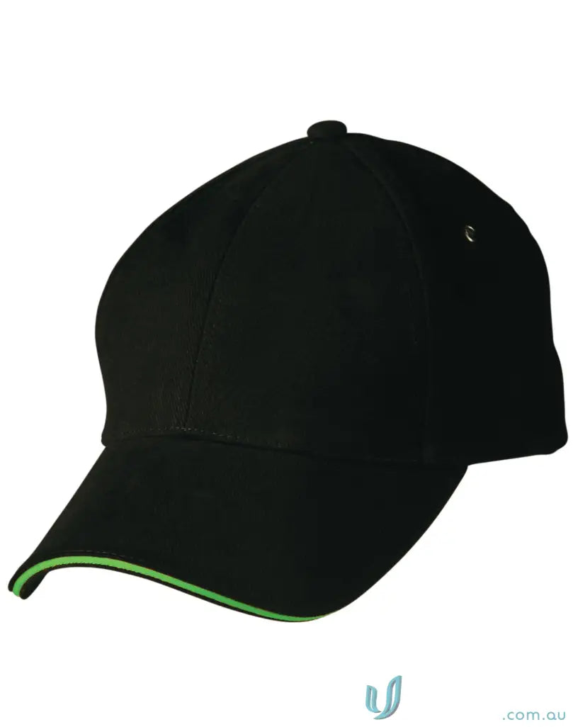Black Sandwich Peak Cap with green trim and tuck-in fabric strap showing winning spirit