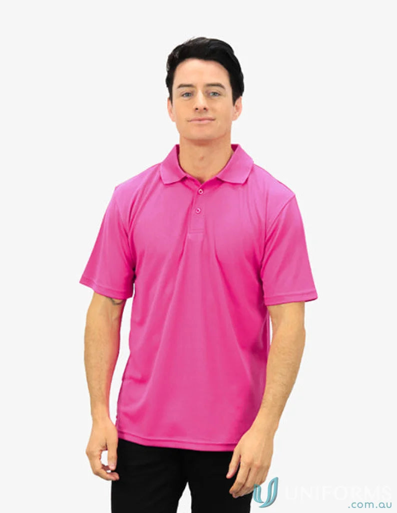 Man in pink Polo shirt with CoolDry technology for moisture management and comfort