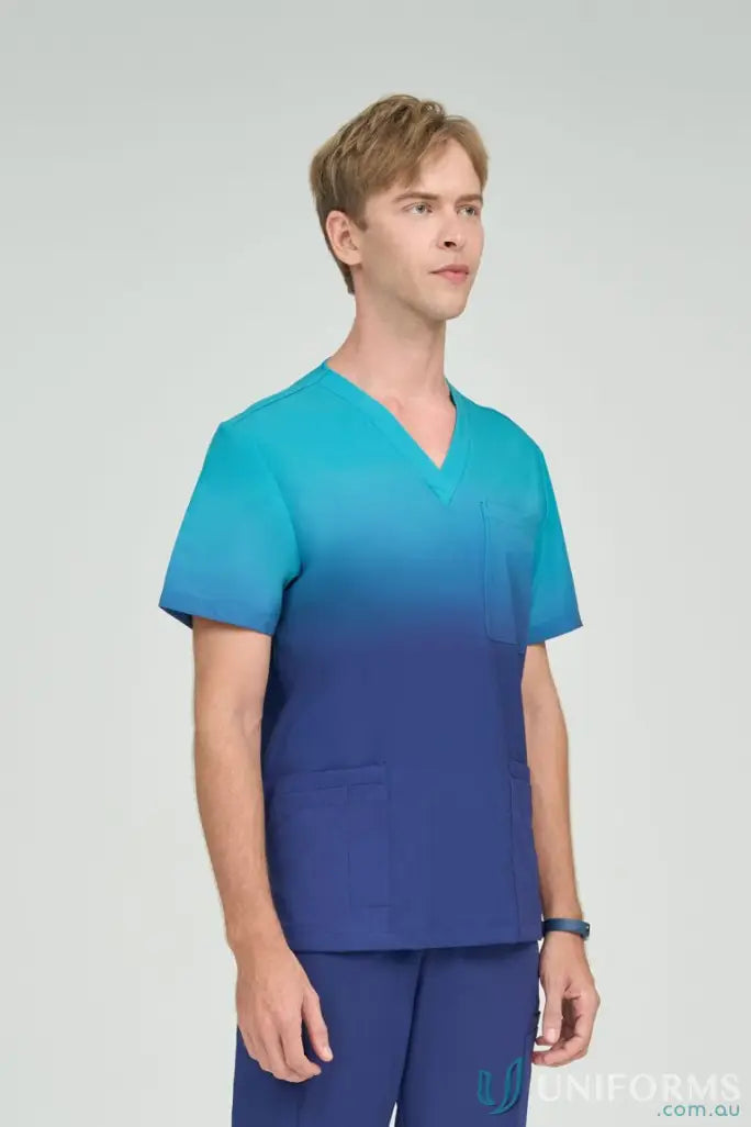 Men’s sea blue inclusive ombre scrub top with matching teal scrub pants from Sea Blue Collection