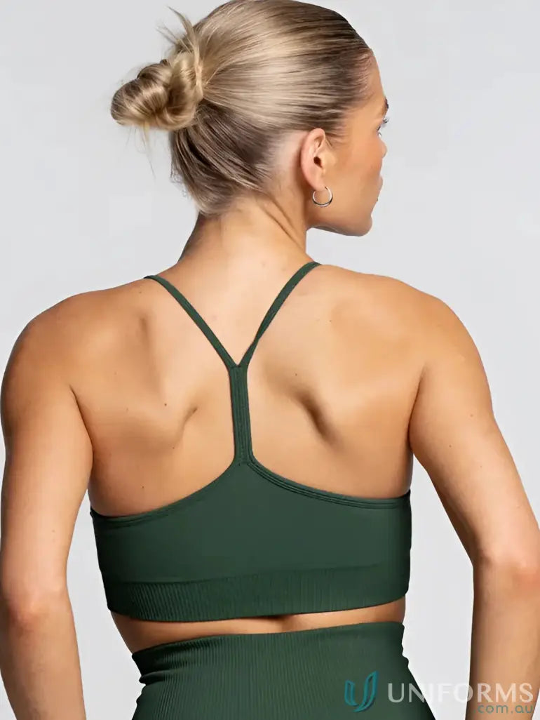 Green ribbed sports bra with flattering scoop neckline from Seamless Emerald Active Crop