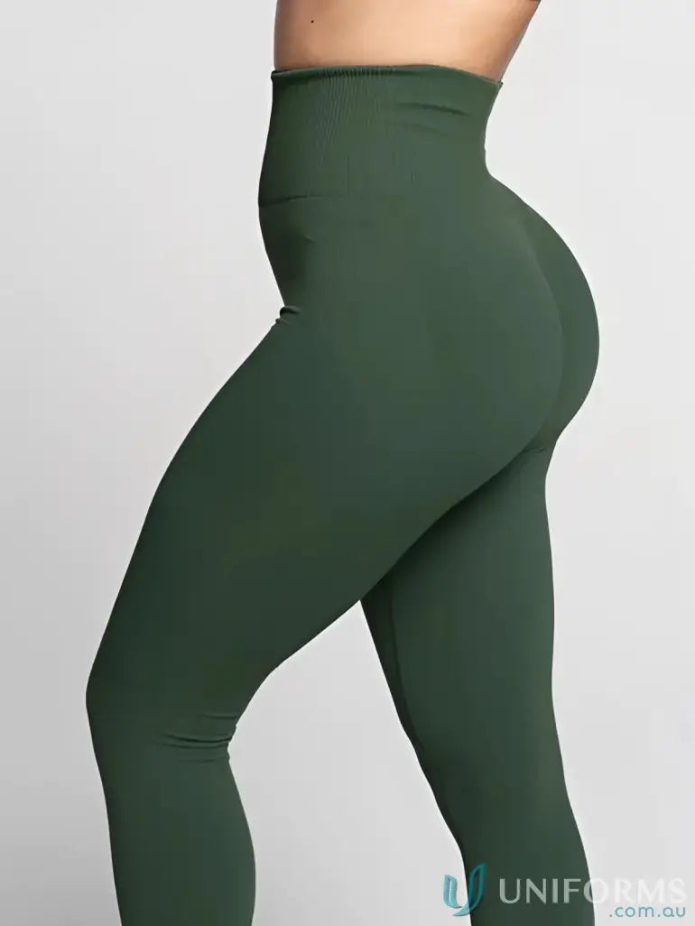 Green high-waisted leggings from Seamless Invisible Scrunch Emerald Leggings, perfect for work uniforms