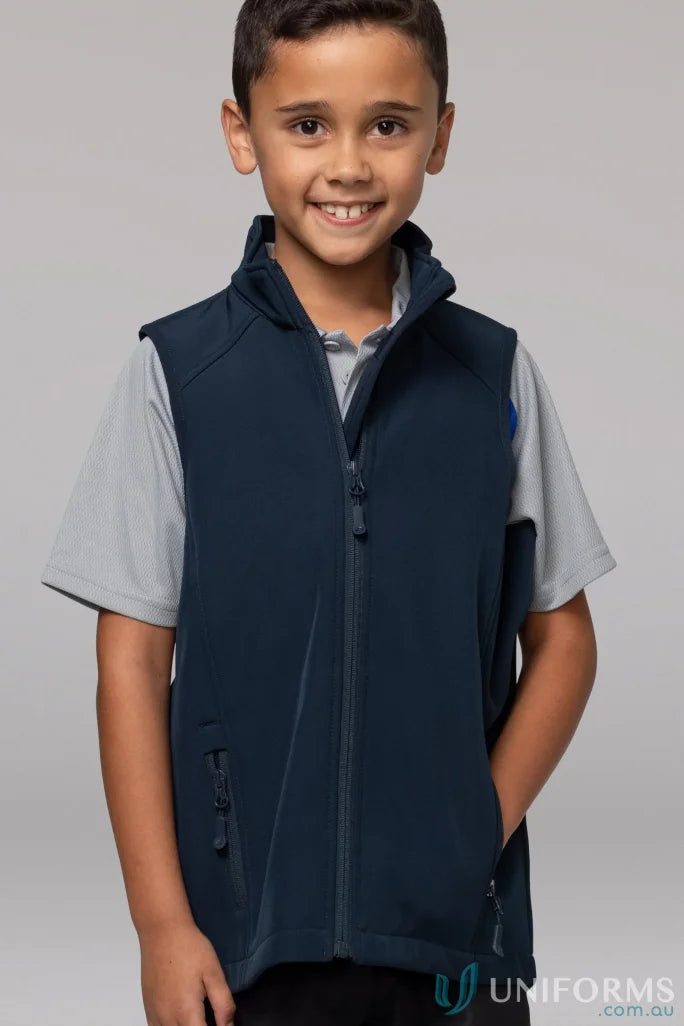 Boy wearing navy blue softshell vest from Selwyn Kids Vests collection