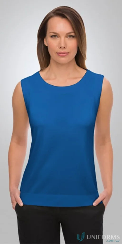 Woman in blue sleeveless top from Smart Knit Sleeveless, perfect for stretch uniforms