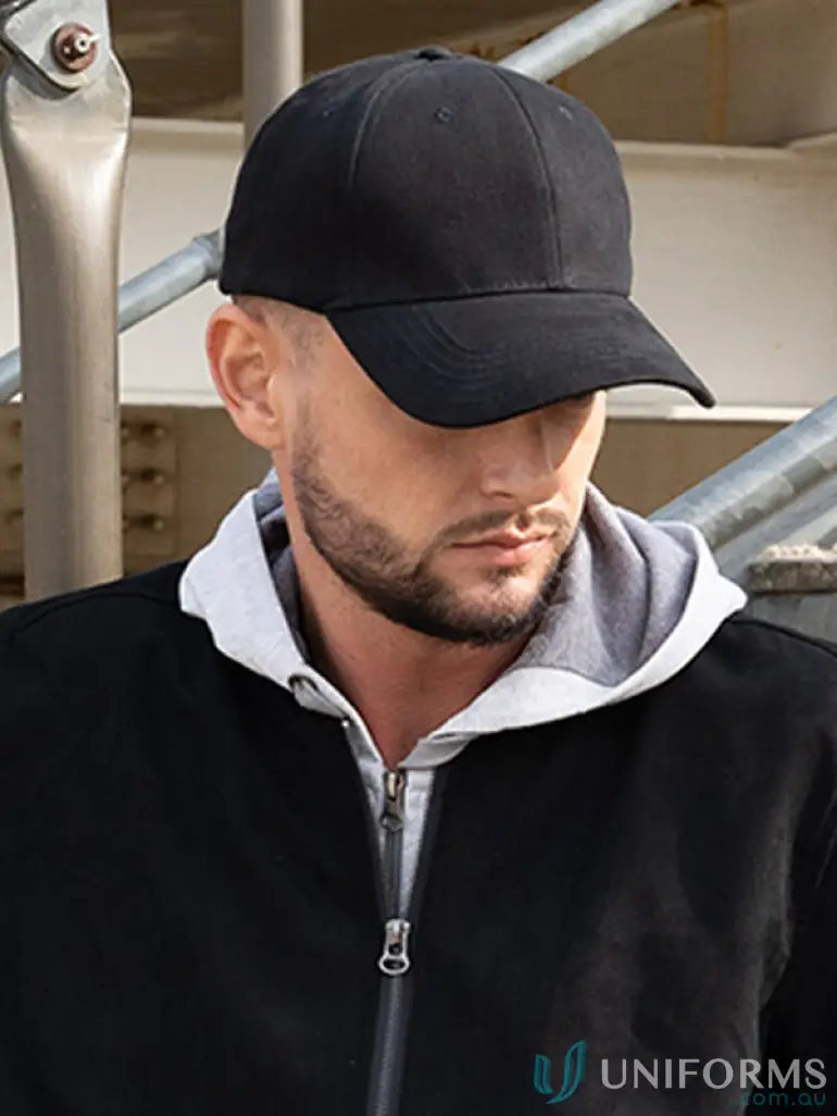 Man wearing black SnapBack Cap with high stock range and imprint details