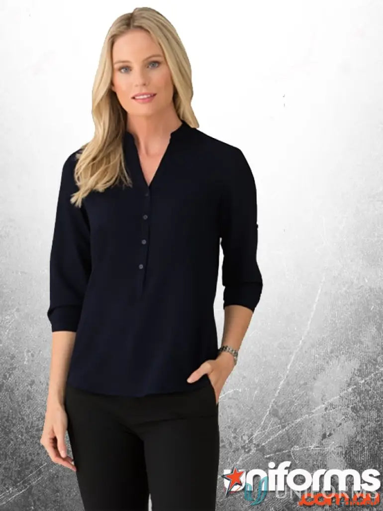 Woman wearing navy blouse and black pants from SoEzy Top, perfect for workwear or uniforms