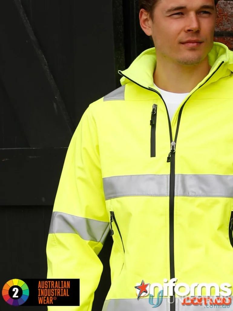 Man in neon yellow SoftShell Heavy Duty Safety Jacket with reflective stripes for duty safety