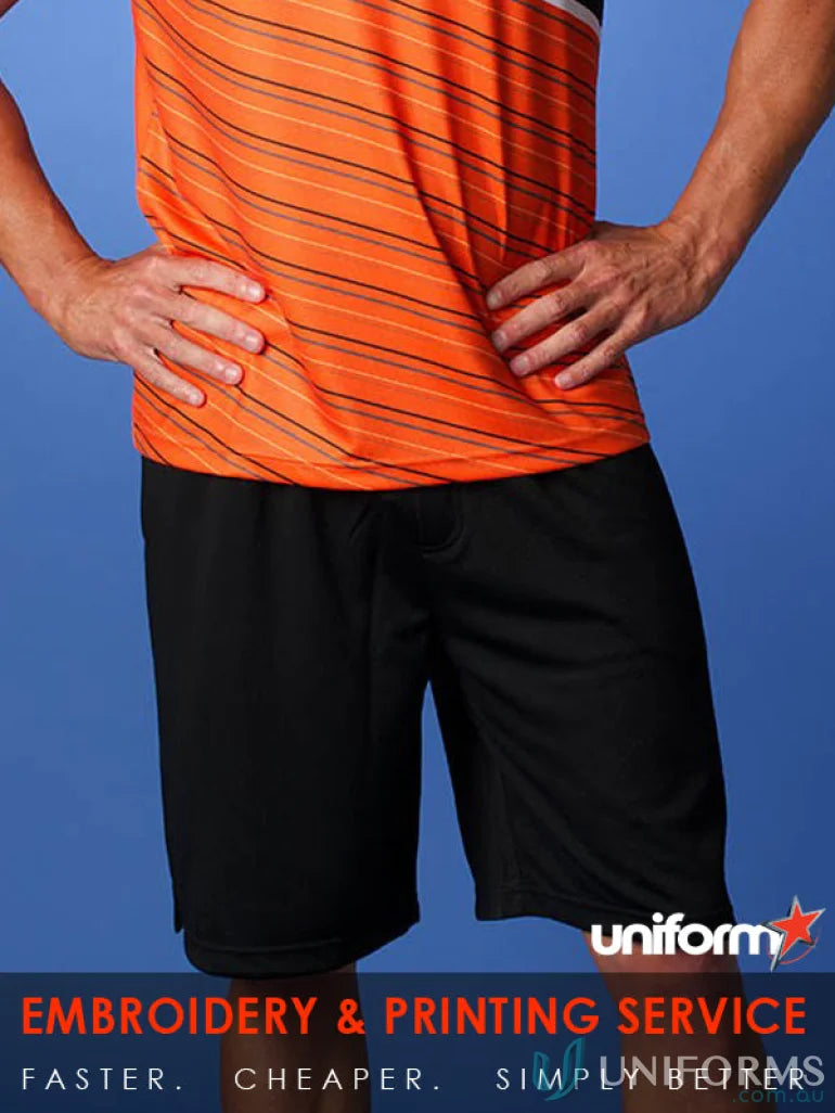 Man wearing orange striped sports shorts perfect for workouts and casual workwear