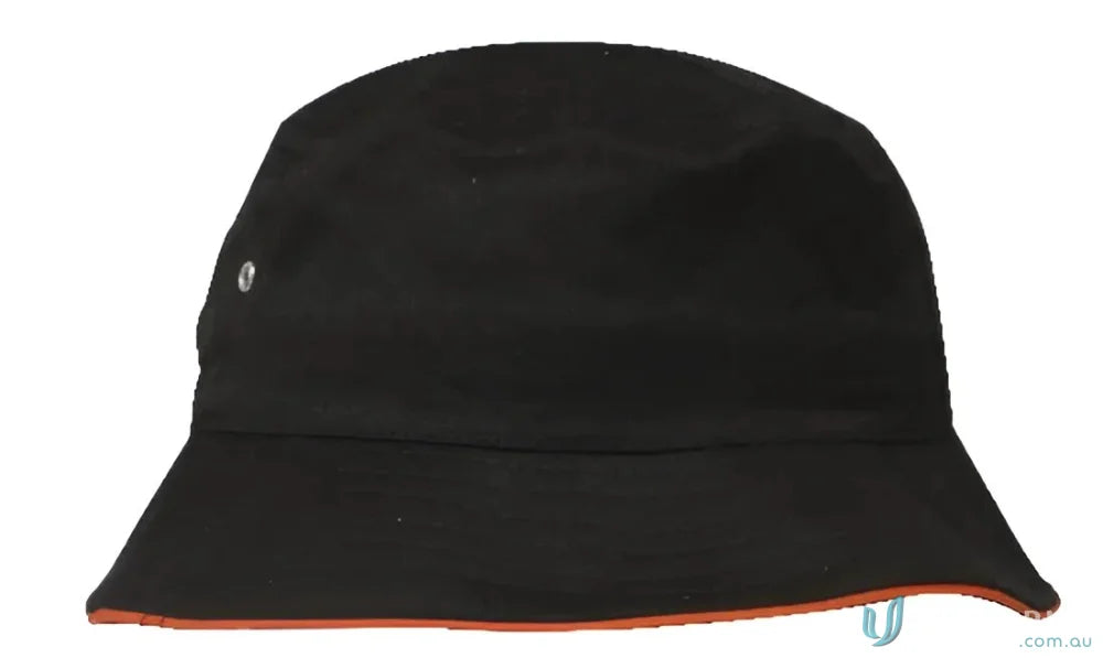 Black sport twill bucket hat with orange trim for a cool twill bucket hat look