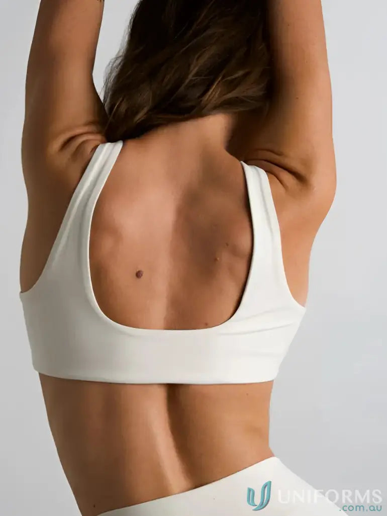 Cream-colored athletic top with square neckline from the Square Neck OffWhite Crop collection